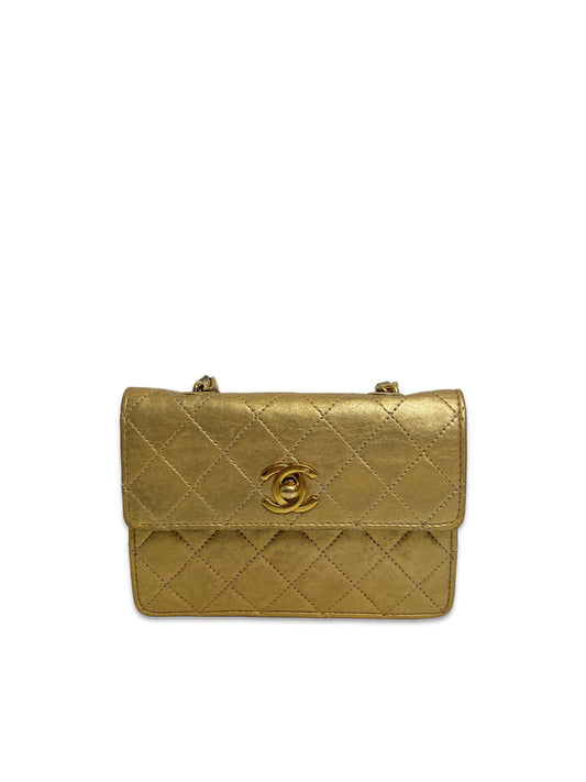 CHANEL vintage gold medallion classic flap