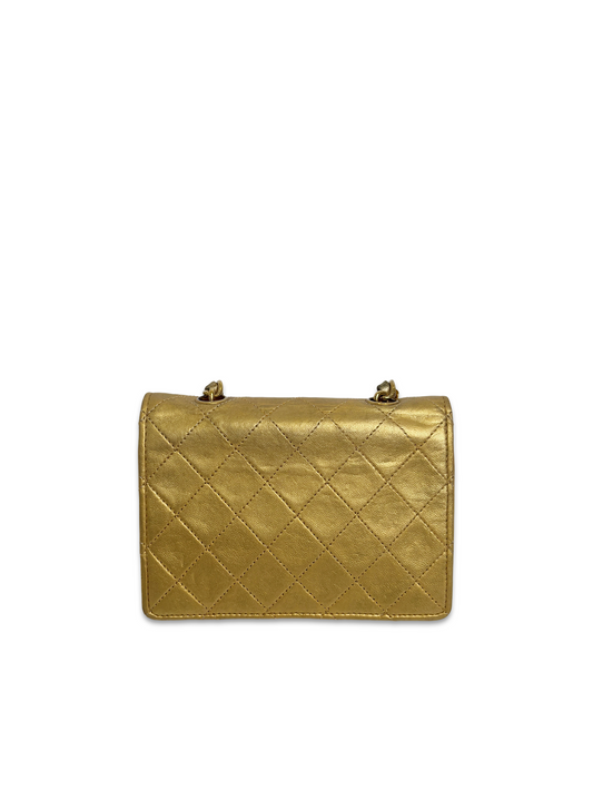 CHANEL vintage gold medallion classic flap