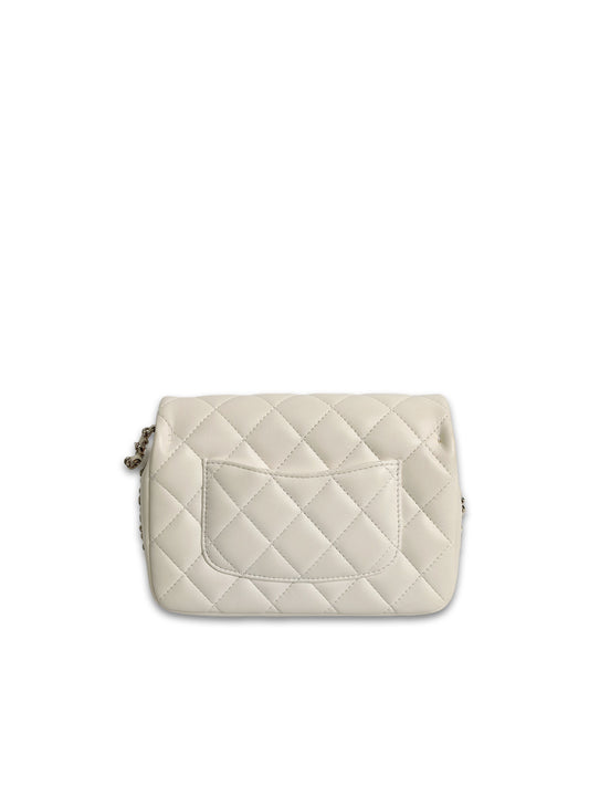 CHANEL mini flap bag with pearl chain